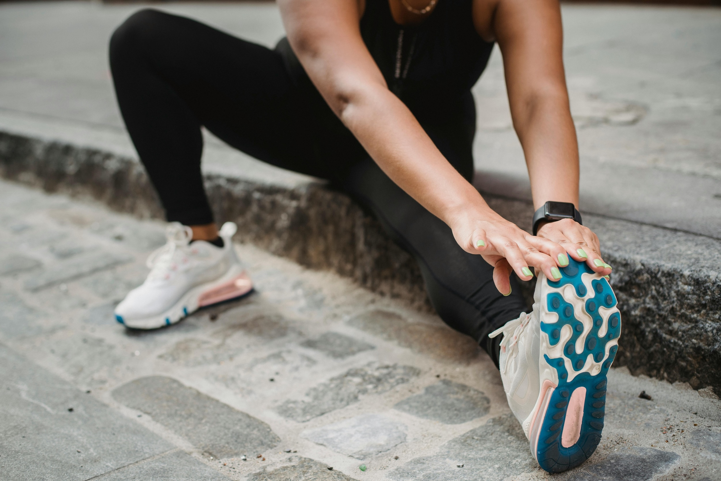 Performance athlete stretching after a workout